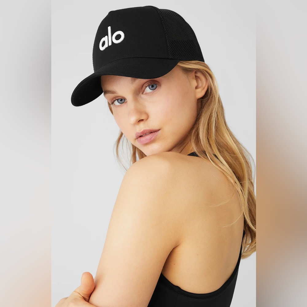 All Yoga District Trucker Hat- black and white. Worn 1x- perfect condition.